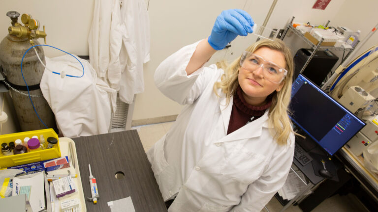 Chemical engineering graduate student Anna Mangus conducts research as part of the MORE program.