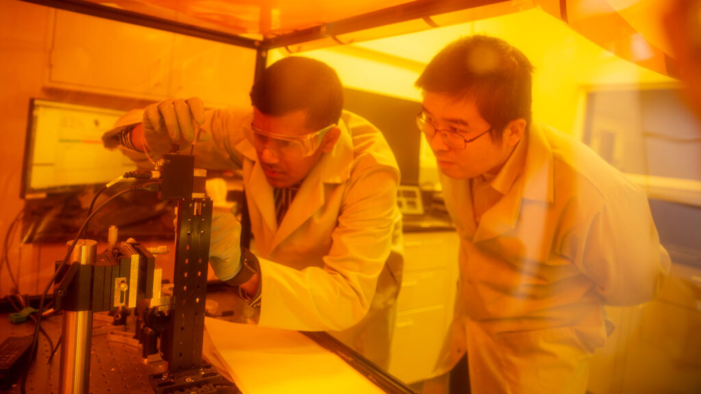 MORE student researcher Chayaank Bangalore Ravishankar and faculty mentor Xiangfan Chen work in the lab.