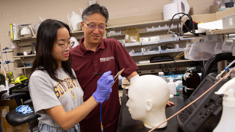 Biomedical engineering major Ava Claire Lariego (left) works with faculty mentor SungMin Sohn on a FURI research project to develop a new material to improve magnetic resonance imaging.