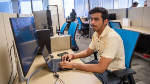 Computer science major Vishal Juneja works on a FURI project to improve the security and reliability of software by improving the Google error-detecting tool called AddressSanitizer.