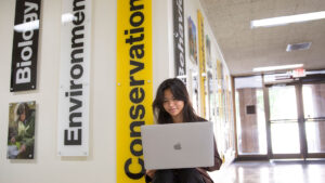 GCSP research stipend student Sofia Vargas works on a laptop.