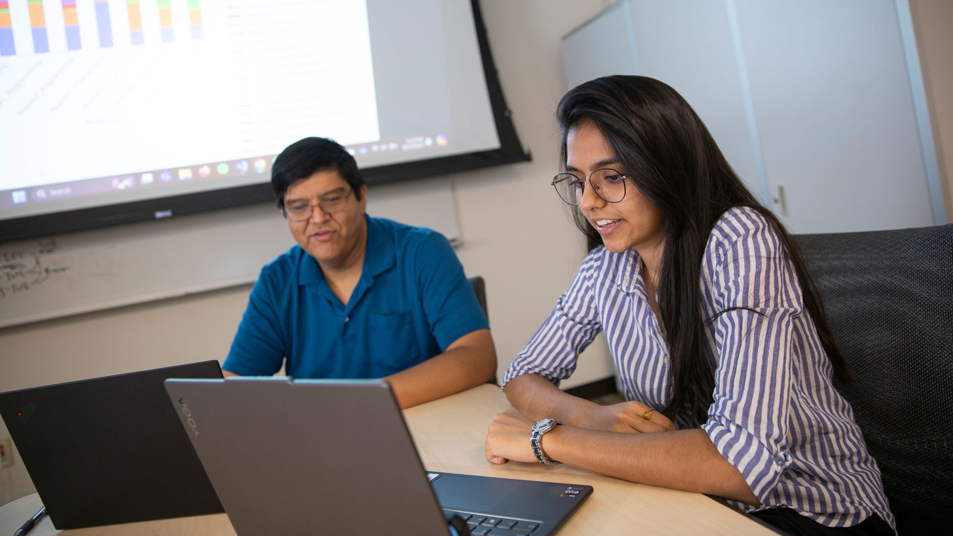 MORE student researcher Devanshi Tushar Prajapati conducts research with her mentor to help improve software engineering education.